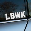 Plotrovaná nálepka s veľkým nápisom „LBWK“ v tučnom písmovom štýle, ideálna pre fanúšikov Liberty Walk úprav.