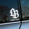 Plotrovaná nálepka s gotickým monogramom „LB“ a nápisom „Liberty Walk“, určená pre fanúšikov japonskej tuning scény.