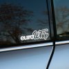 Plotrovaná nálepka, dizajnový text "euro Whip" v neformálnom kurzívnom font-štýle, obľúbený motív pre tuning a car styling.