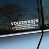 Plotrovaná nálepka s humorným akronymom VOLKSWAGEN – Voluntarily Overengineered Lovingly Kept Simple While Avoiding Grand Expensive Nonsense.