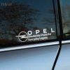 Plotrovaná nálepka s logom Opel a akronymom OPEL – Obediently Powerful Everyday Legacy.