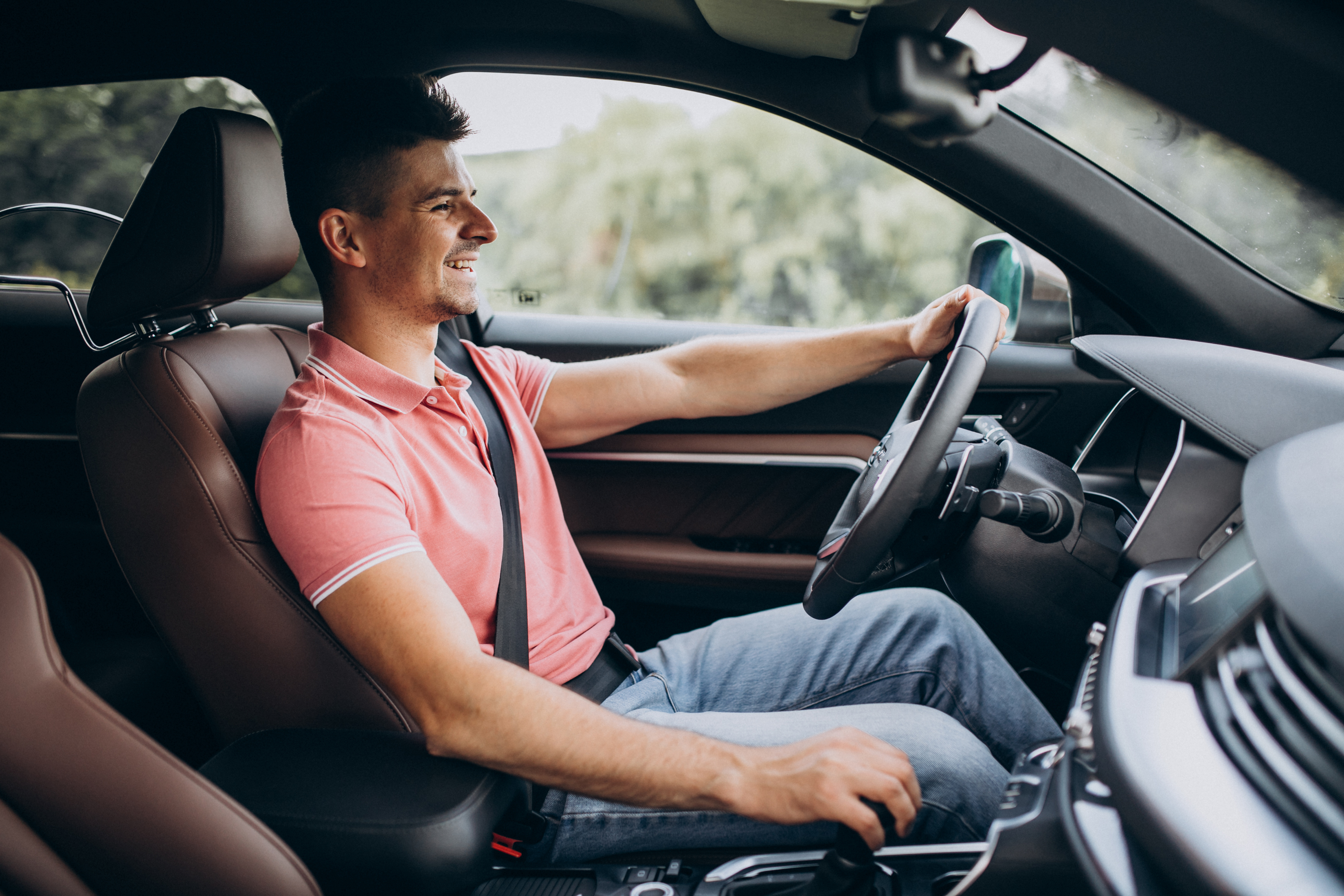 handsome-man-driving-his-car