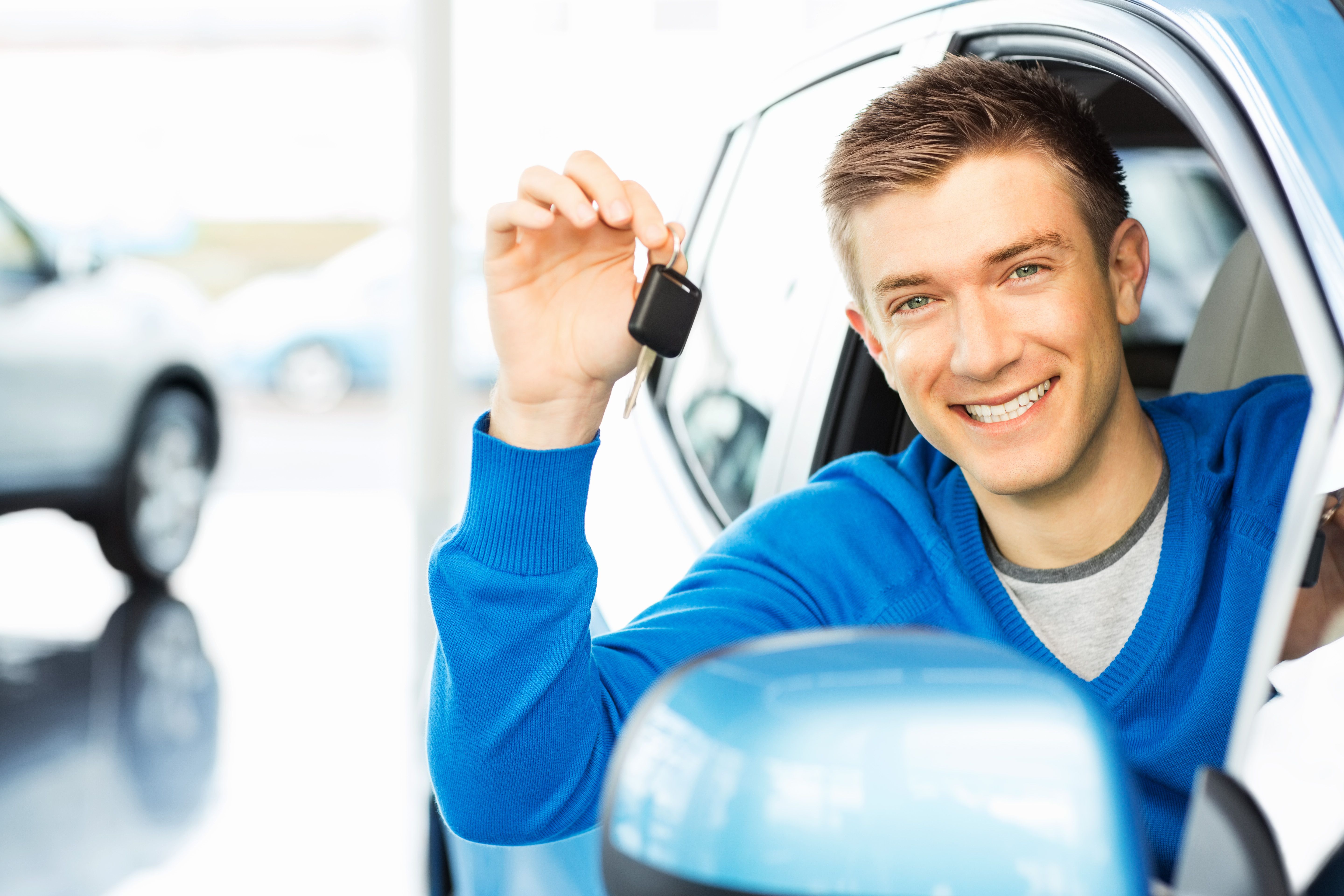 happy-man-holding-car-key-royalty-free-image-1585169258