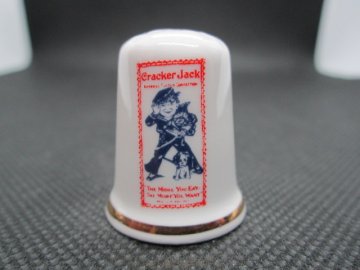 Sběratelský náprstek - Derby Thimbles England - Reklama Cracker Jack USA, popcorn a arašídy s karamelem