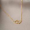 Pozlaceny ocelovy nahrdelnik dve srdce SYMBOL LASKY