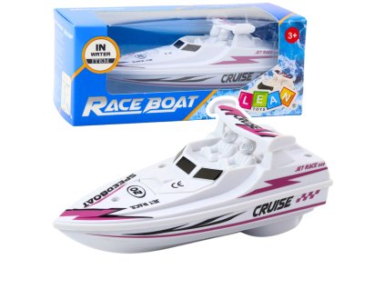 Bílý motorový člun na baterie plovoucí na vodě