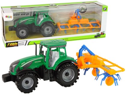 Zelený traktor s oranžovo-modrým shrnovačem, třecí pohon