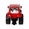 Červený traktor s kultivátorem a třecím pohonem