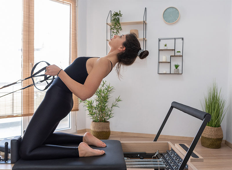 Pilates Reformer: Co to takiego i dlaczego warto włączyć go do swojego treningu?