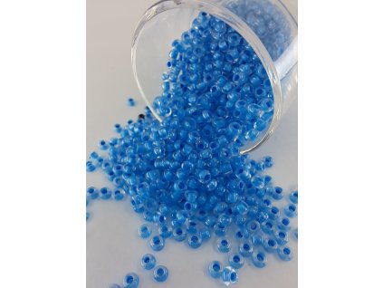 Rokajl Preciosa 6/0 - transparentní - světle modrý průtah - 1 g