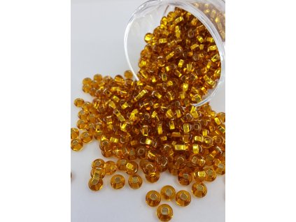 Rokajl Preciosa 6/0 - transparentní zlatá - zlatý průtah - 1 g