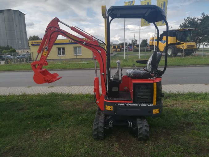 rypadlo, minibagr, nakladač yanmar 12 oranžové barvy na pásech se lžící