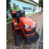 profi zahradní traktor kubota G23 oranžové barvy u plachty traktory kolín