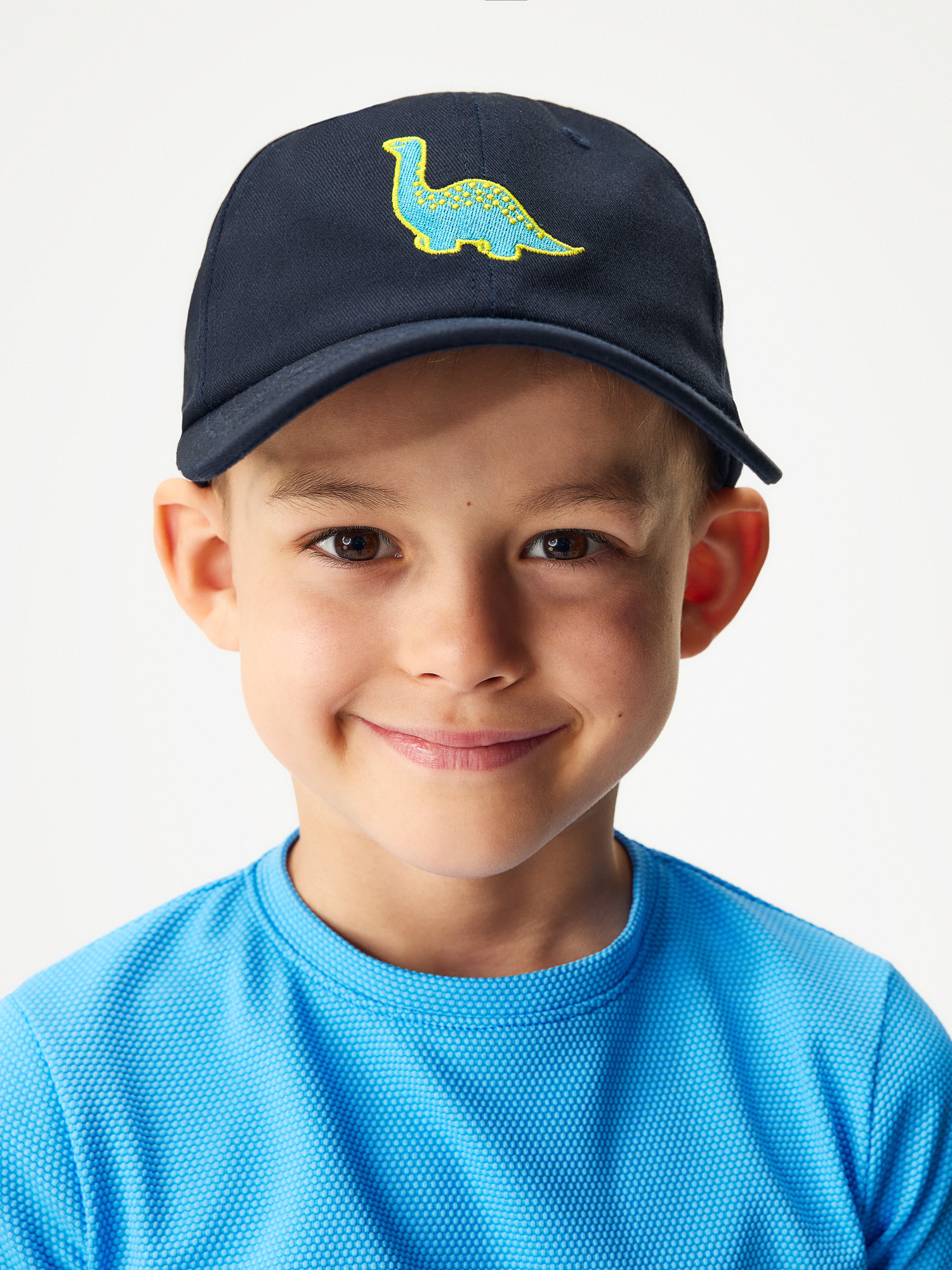 Dětská kšiltovka UNUO Tm. Modrá, Dinosauři Velikost: S (45 - 48 cm)