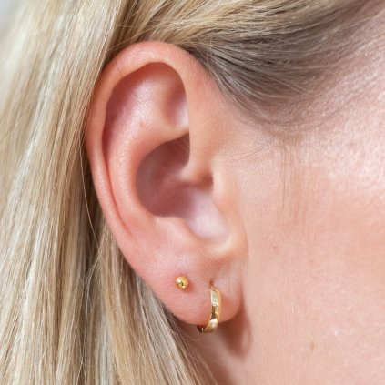 Gold Dot piercing