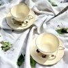 Porcelánová šálka na nohe s podšálkou Ecru Butterflies 125 ml sada 2ks