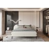 Boxspring posteľ RAIN - krémová - pohľad spredu - v interiéri spálne
