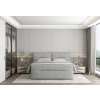 Sivá boxspring posteľ - v modernej spálni - pohľad spredu - celkový záber