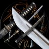 Tréninková replika meče wakizashi Shikai z překládané uhlíkové oceli s autentickým hamonem.
