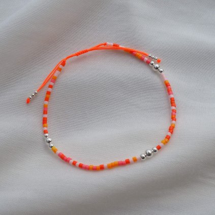 Šňůrkový náramek na kotník Coral stříbrný flat lay Nufs Design