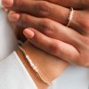 Set náramek a prstýnek Pearl Belle z gold filled materiálu a malých říčních perliček Nufs Design