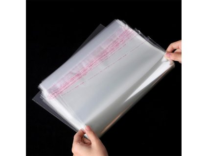 200ks průhledných celofánových sáčků 9 x 27 cm se samolepícím uzávěrem (1)