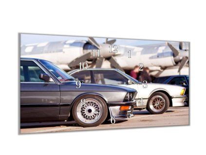 Nástěnné hodiny 30x60cm dvě auta veterán (Materiál kalené sklo)