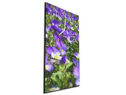 Nástěnné hodiny rozkvetlé fialové macešky 30x60cm (Materiál kalené sklo)