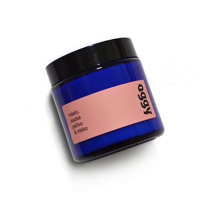 modrá sójovo-kokosová svíčka oggy Máslo, sladké pečivo, mléko v modrém skle