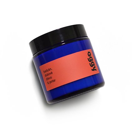 modrá sójová svíčka oggy badyán, dubové dřevo, jantar v modrém skle