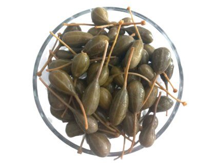 Kaprigyümölcs szárral, üveg tálon