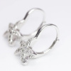Súprava strieborných šperkov HVĚZDICE so vsadenými zirkónmi - náušnice, prívesok a prsteň. Strieborníctvo OLIVIE.