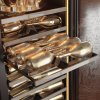 CHAMPAGNE CABINET SLIDING SHELF DETAIL CLOSE UP