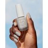 dawn of a new gray nat027 nail lacquer 99350087084 hand and bottle