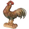 řevěná vyřezávaná soška kohouta. Velikost zvířat v betlémech neodpovídá výšce zvířete, ale stojícím postávám v betlému. Betlém je tak velmi reálný a věrohodný.