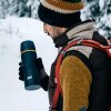 Esbit termoska 0,5 l černá na horách v rukavicích