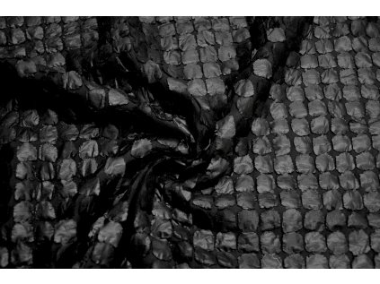 Černá originální látka s plastickými elementy