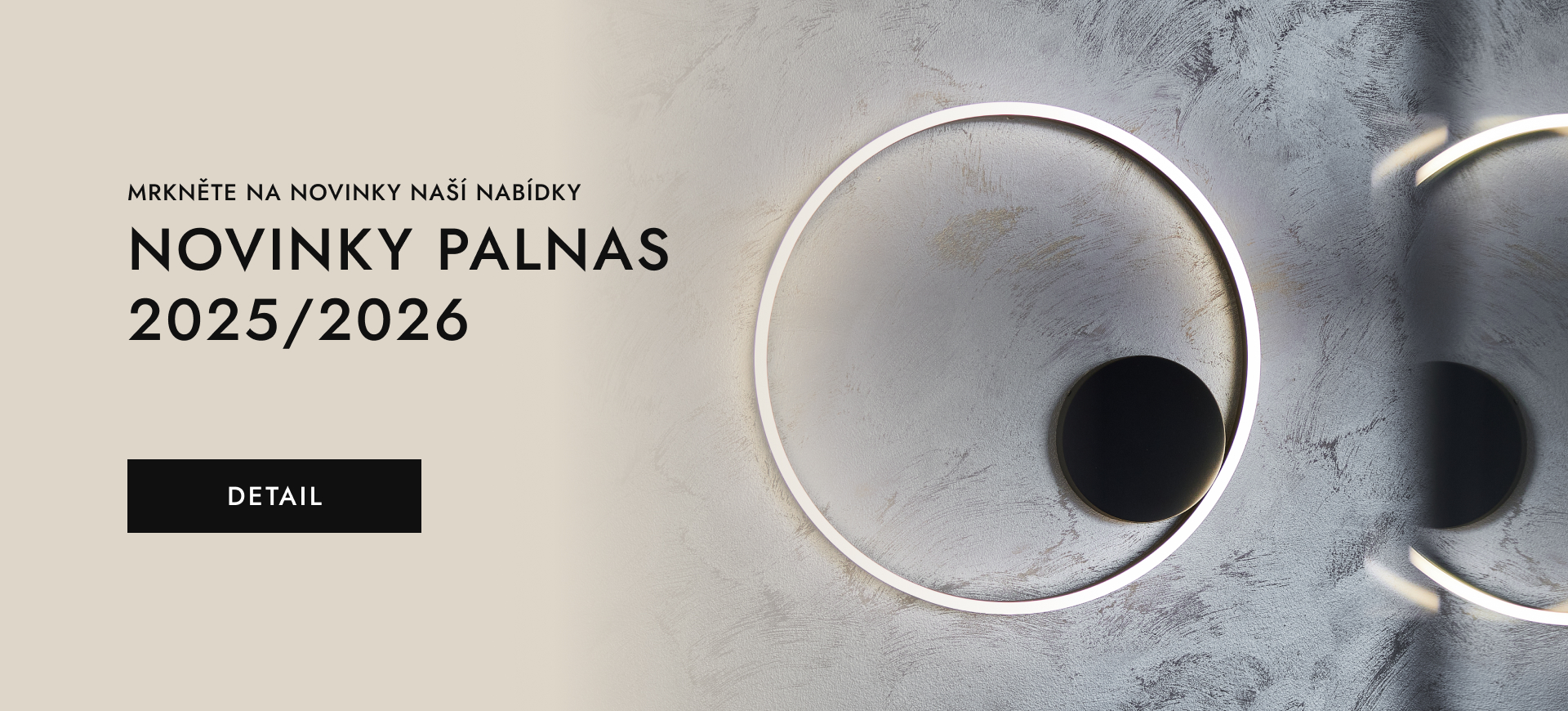 Nástěnné LED svítidlo černé barvy.