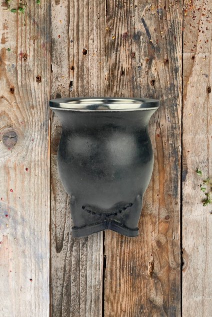 calabaza černá na dřevu