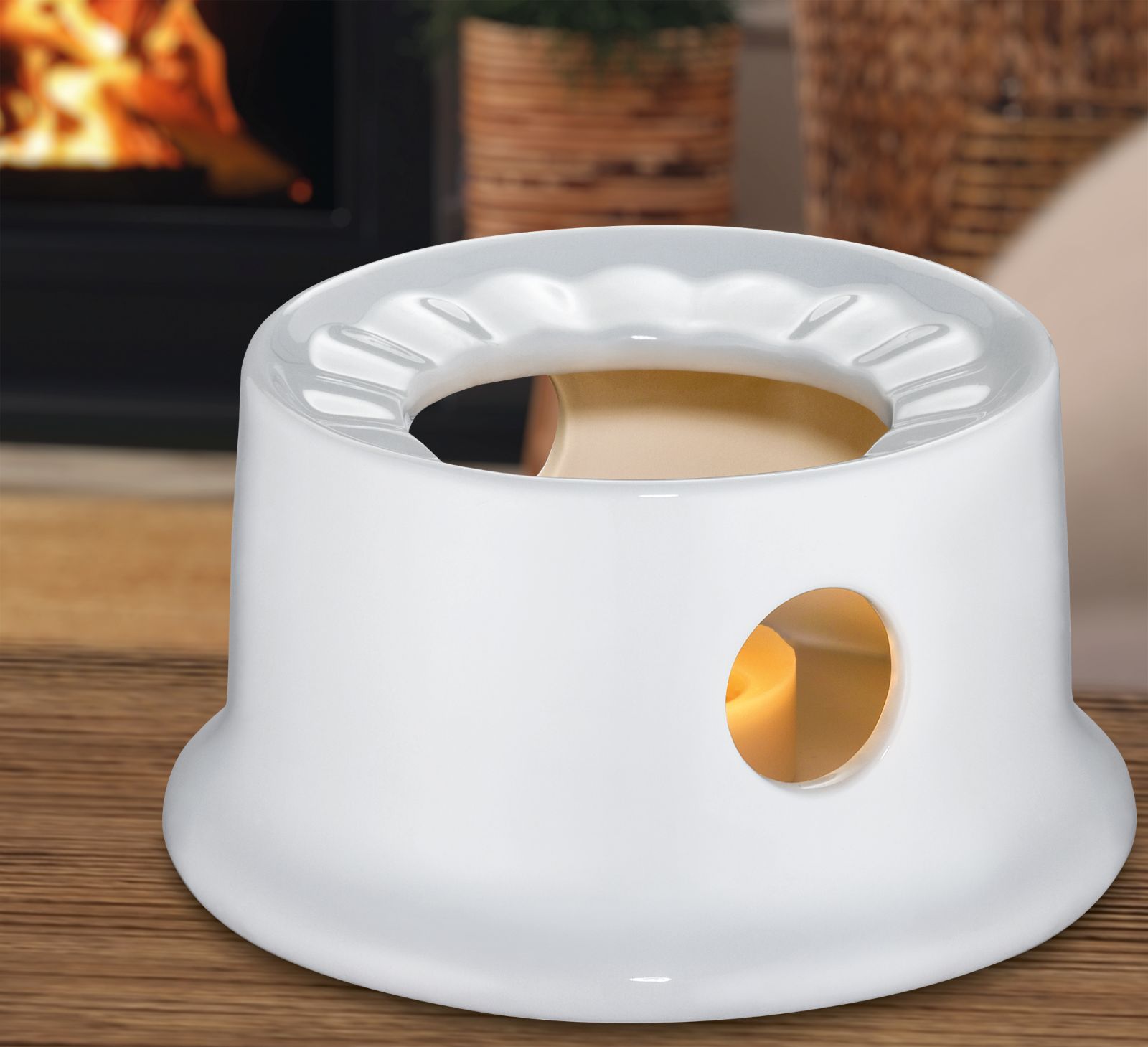 Ohříváček čajové konvice.