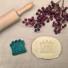 Plastové vykrajovátko s krbem – originální vánoční design pro kreativní pečení.