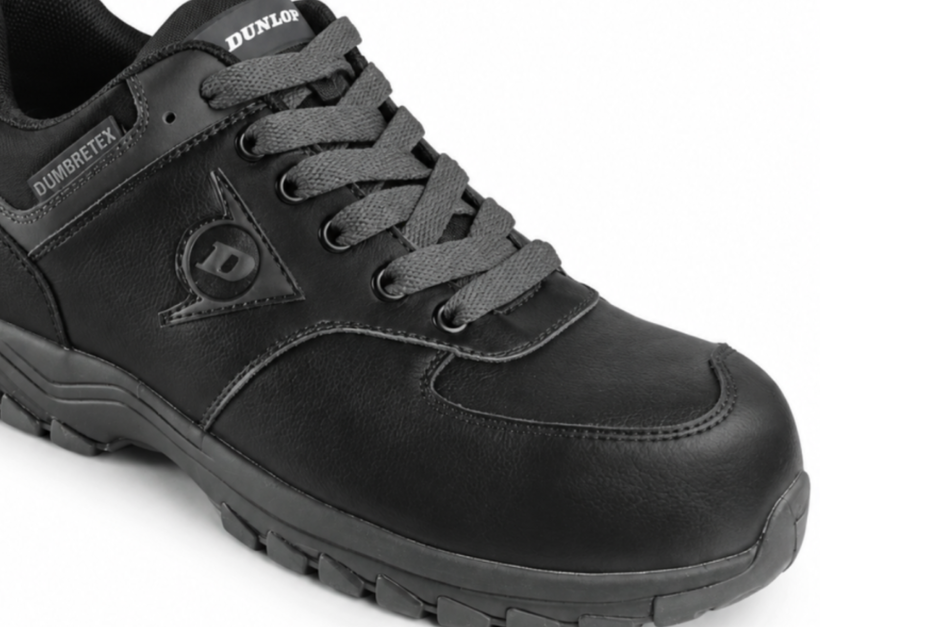 Detail hladkého koženého svršku bezpečnostní polobotky Dunlop Arrow All Black S3