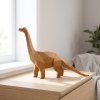 Papírový model Dinosaurus na stolku u okna