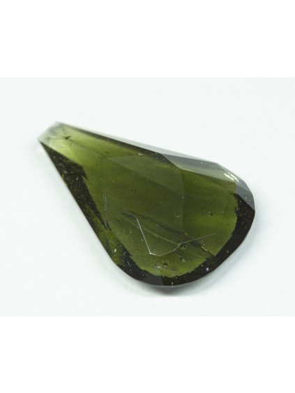 Faceted moldavite with a rare bubble