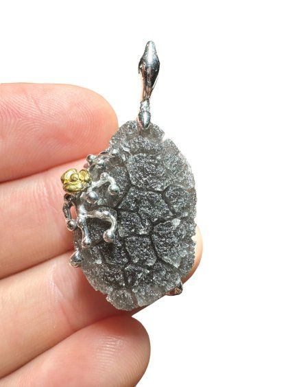 Silver pendant made from carpathian obsidian