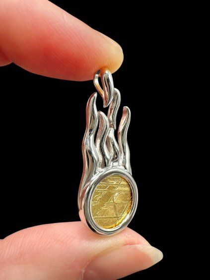 Comet pendant made from the Aletai meteorite