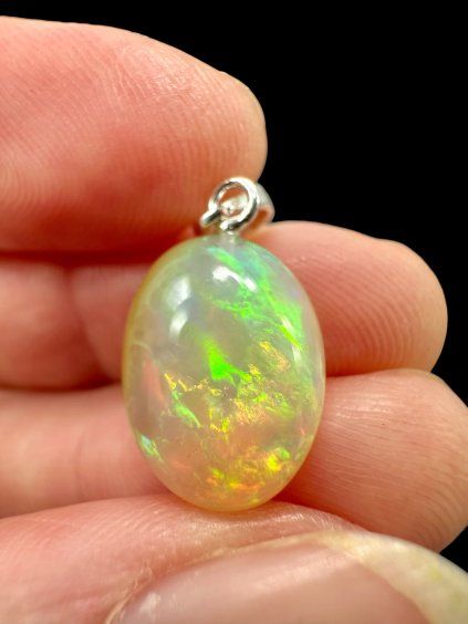Silver faceted precious opal pendant