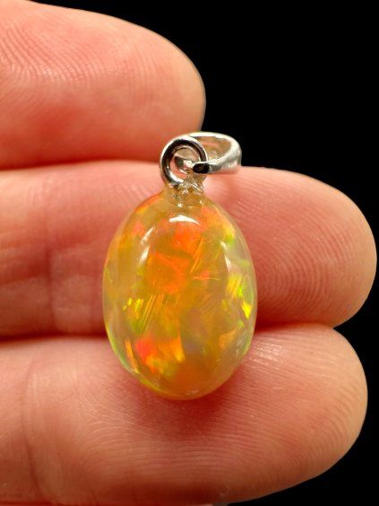 Silver faceted precious opal pendant