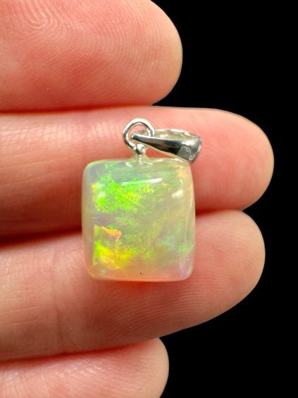 Silver faceted precious opal pendant