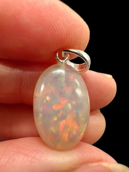 Silver faceted precious opal pendant